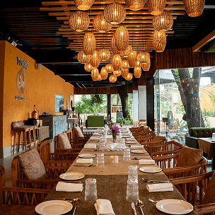 Elegant dining table setup in a warm restaurant setting